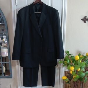 Elegant Black Tuxedo with Notched Lapels By CRICKETEER